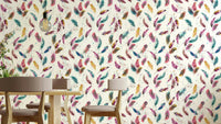 Delicate watercolor feathers in multicolored palette

