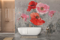 Watercolor Red and Pink Flower poppy wallpaper behind a white freestanding bathtub and copper shower in a bathroom