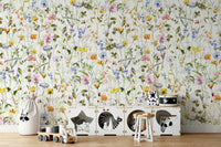 The scene includes colorful wildflowers and blooms.

