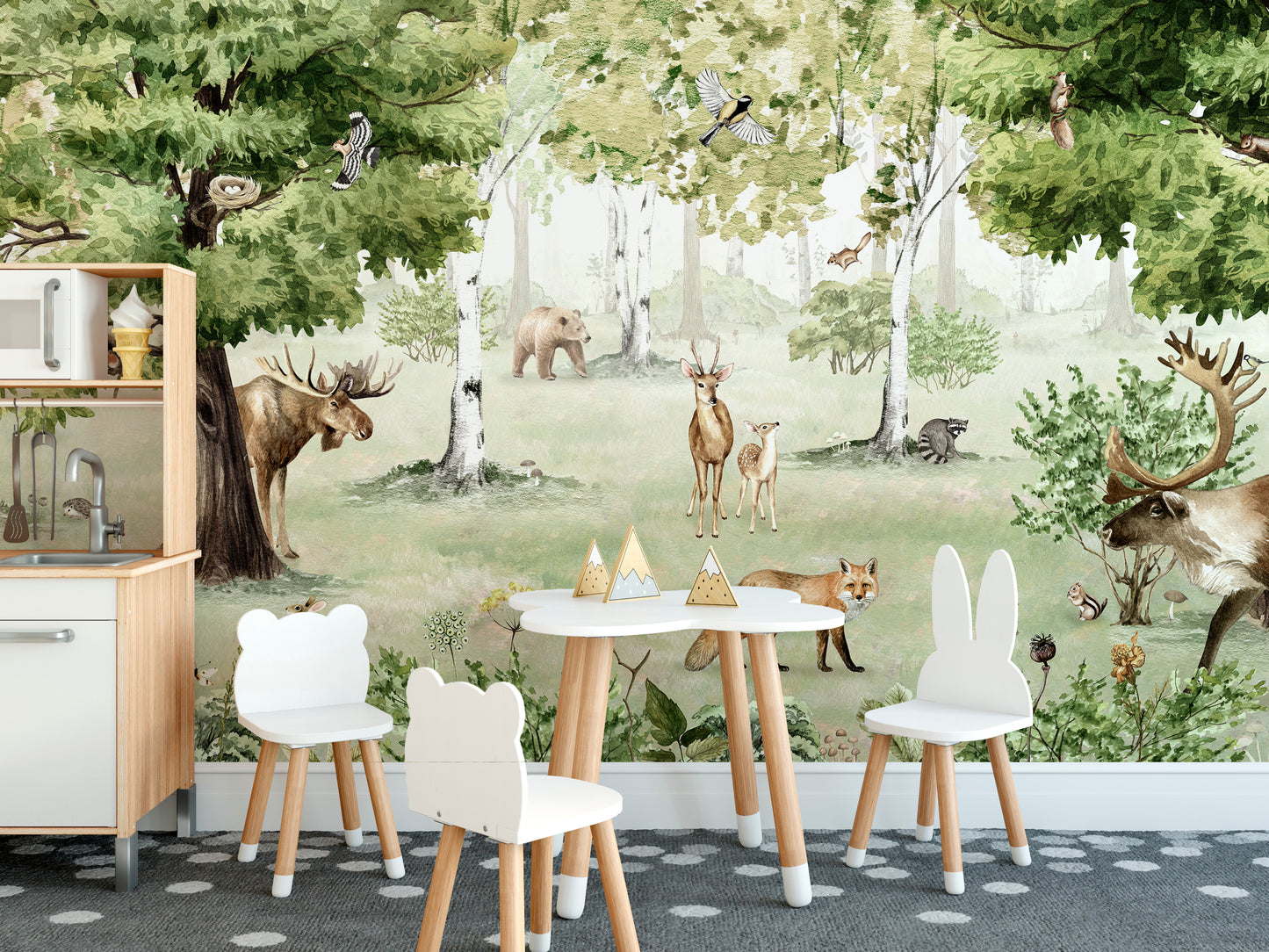 Watercolor Woodland Wonders wallpaper mural in a playroom with a white play kitchen and bear and bunny ear chairs