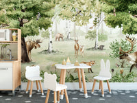 Watercolor Woodland Wonders wallpaper mural in a playroom with a white play kitchen and bear and bunny ear chairs