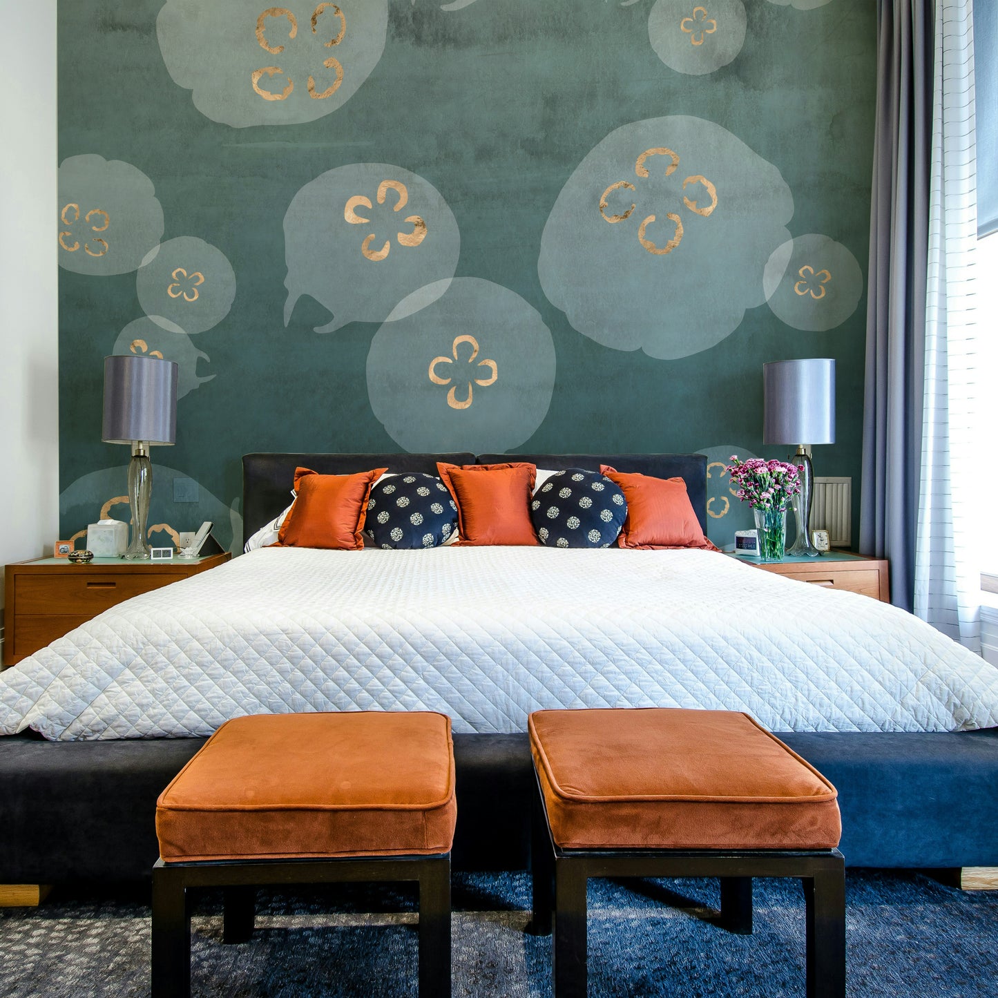 Jellyfish in watercolor tones with gold accents on petrol background.

