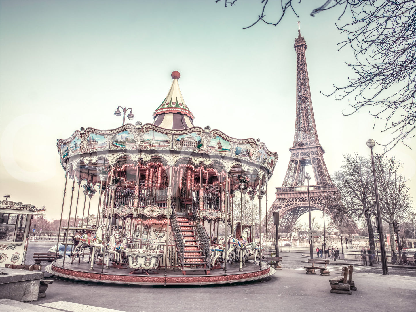 Parisian carousel and Eiffel Tower mural for charming decor.

