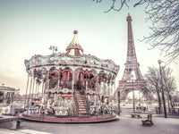 Parisian carousel and Eiffel Tower mural for charming decor.

