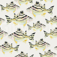 Coastal interior featuring fish motif wallpaper

