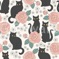 Captures the essence of playful felines in a blooming garden.

