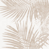 An artistic wall covering with jungle leaves.