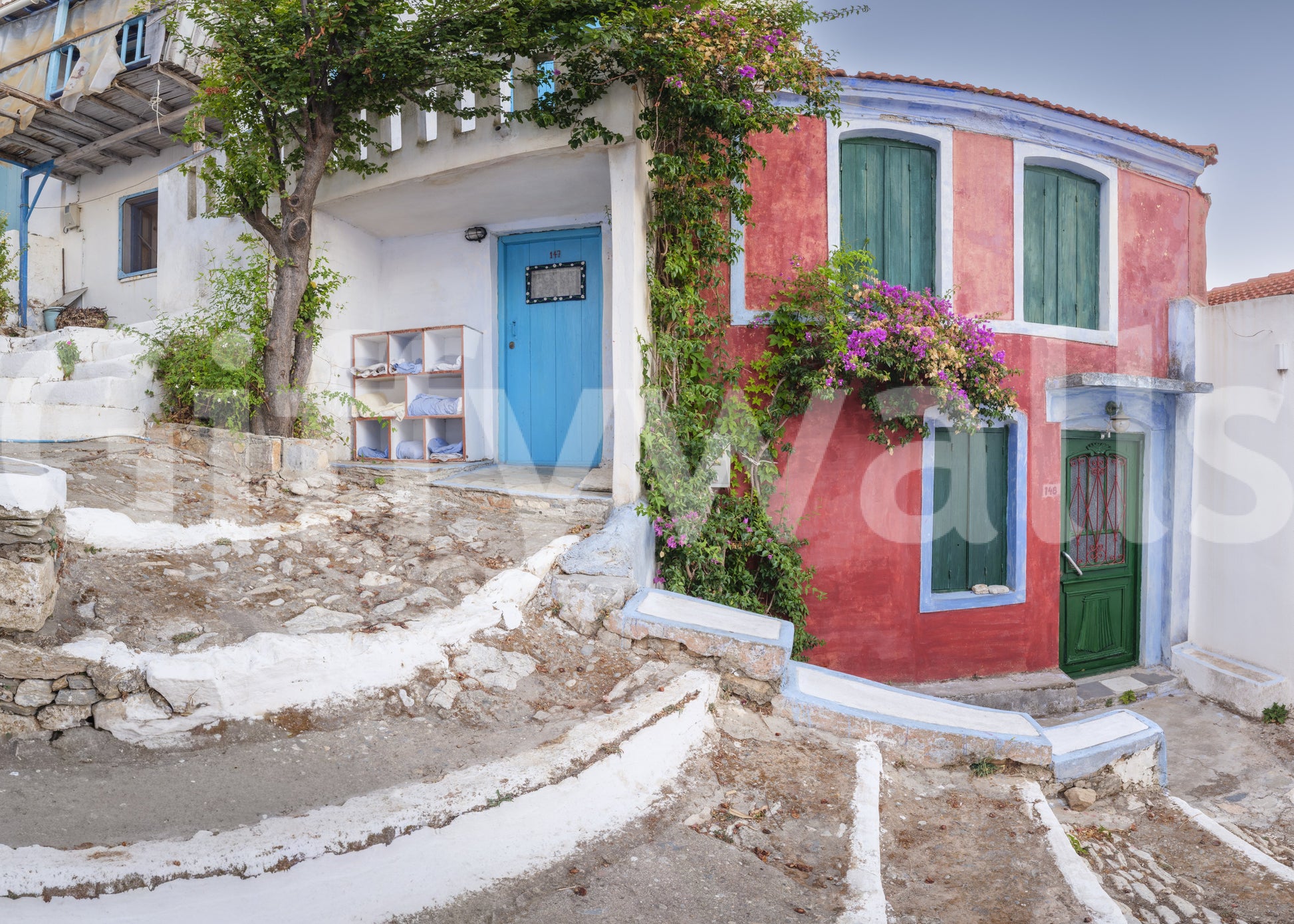 Coastal Cottage Charm Azure and cerise house photographic mural.