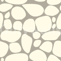 Decorative Pebble Beach wall art irregular white pebble arrangement.