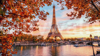 Eiffel Autumn wall mural with glowing tower above the Seine at sunset
