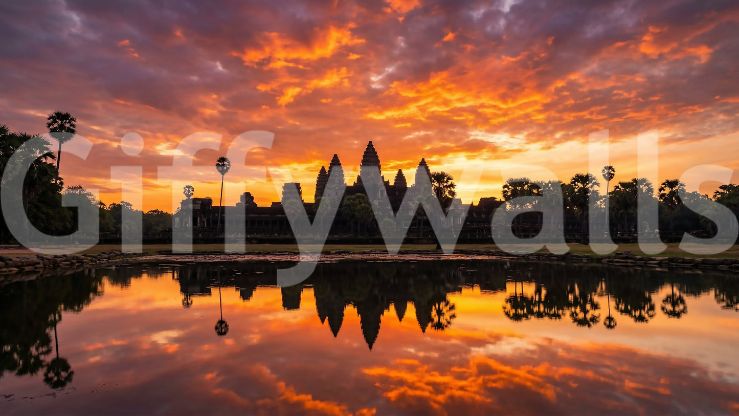 Architectural silhouette wall mural with sunset tones and reflection