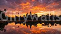 Architectural silhouette wall mural with sunset tones and reflection