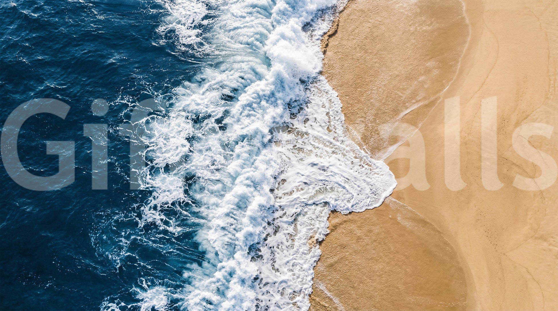 Sea vs land wall mural with aerial surf lines cutting across warm golden sand textures