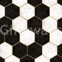 Luxe wall mural featuring repeating hexagons in black, white and gold tone