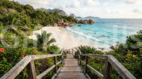 Hazy green peaks rise behind the shoreline in the Turquoise Shores wall mural