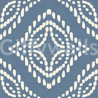 A deep slate blue ground makes the cream block print wallpaper read crisp and bold