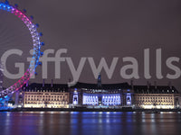 Embankment beams under purple and pink lights in this London Night Glow wall mural