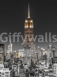 A prominent architectural spire dominates the central focus of the dark Gold wall mural.