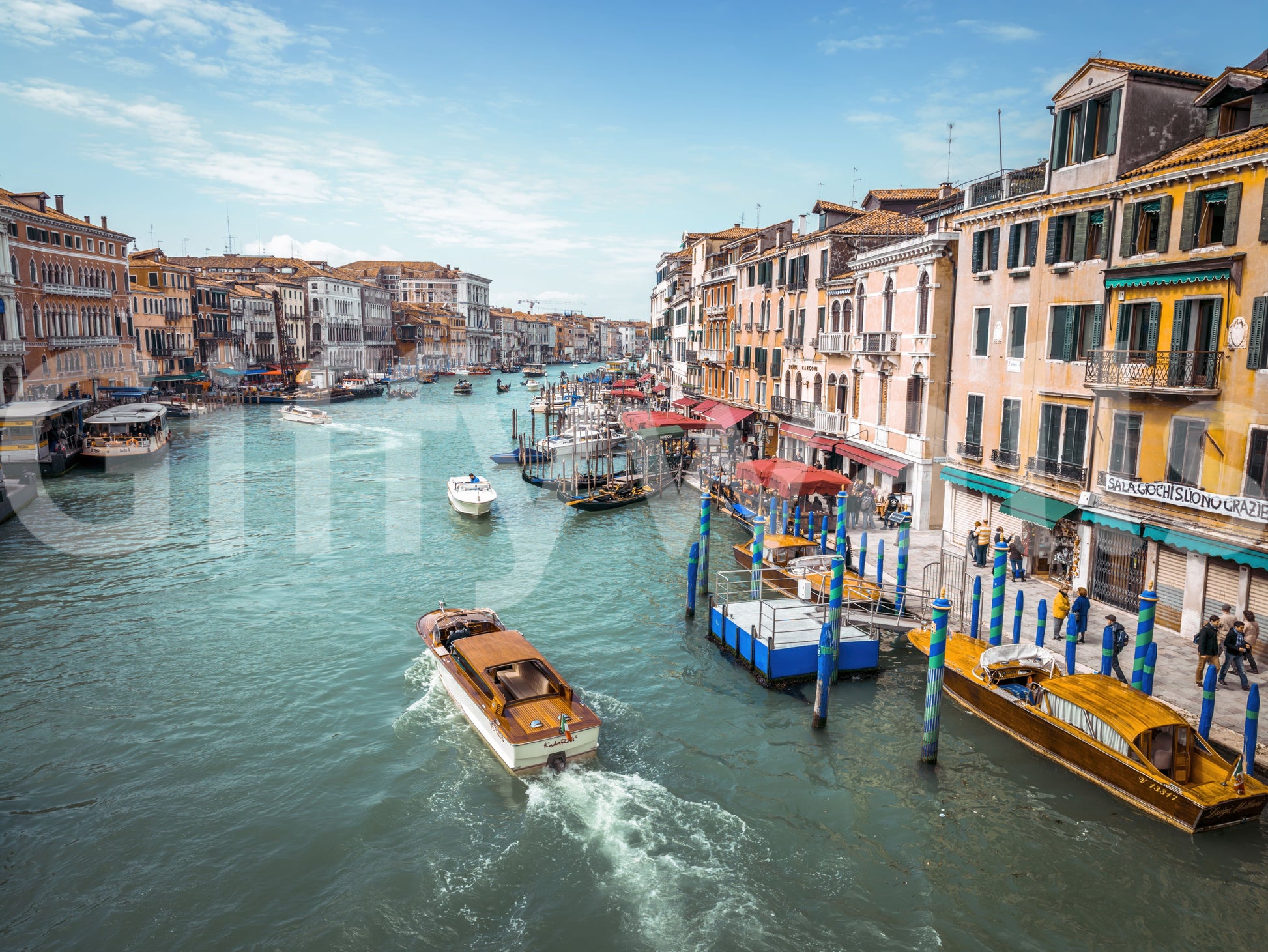 Clear water flows gracefully through the detailed Canal wall mural.