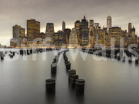 Charcoal towers in the NYC Urban Glow wall mural mix with amber window light