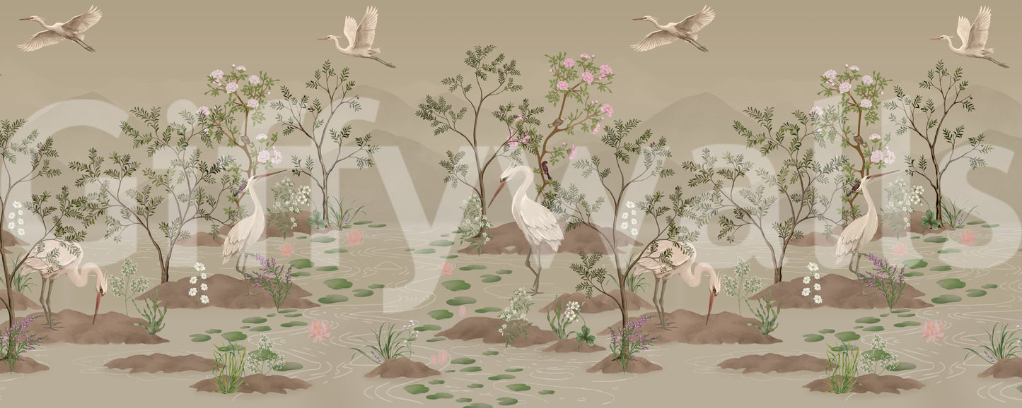 Misty taupe mountains sit behind the painted trees of this wall mural