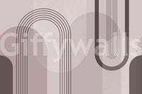 Matte mauve gradients keep the wall mural quiet under and warm lamps
