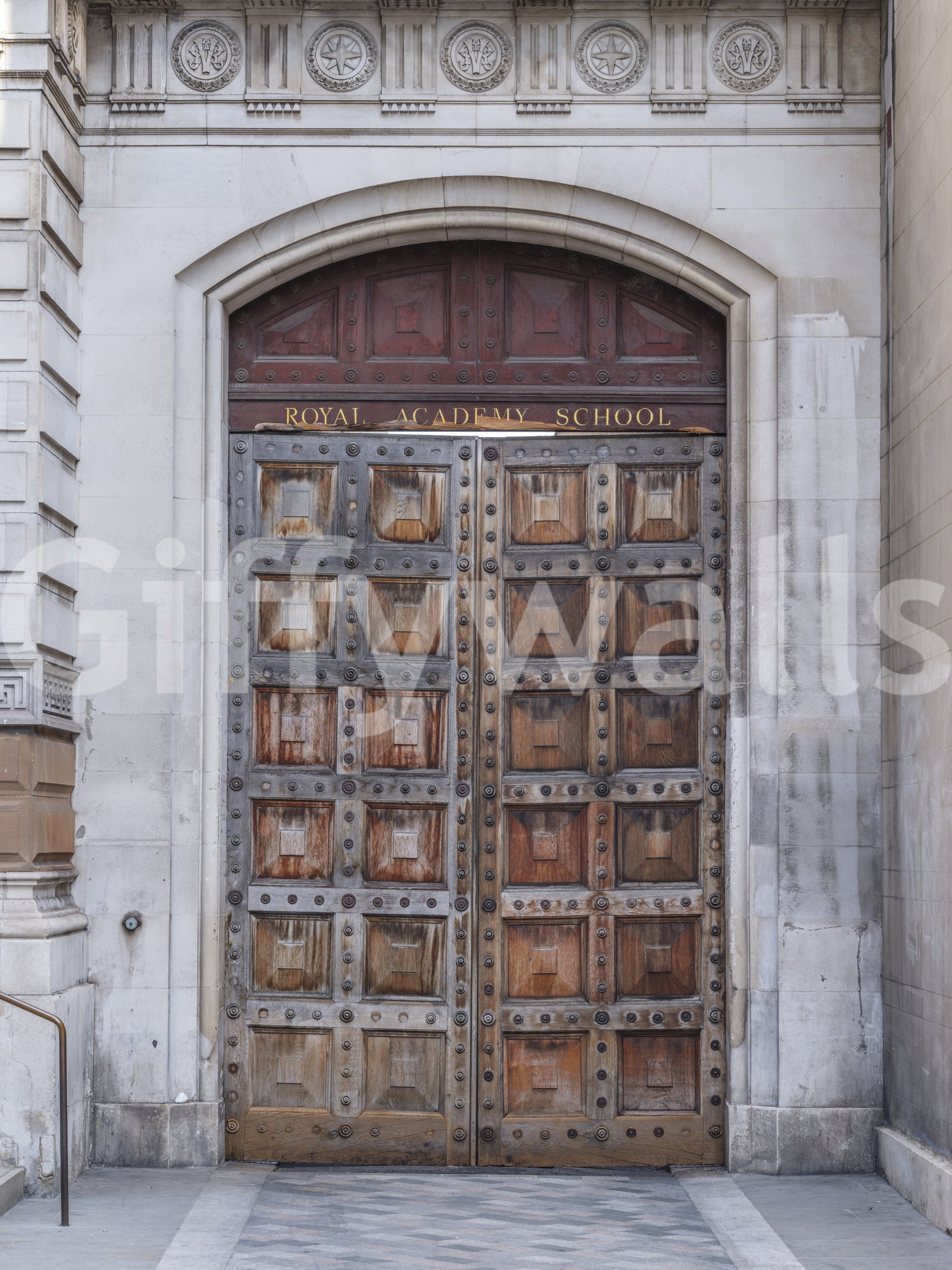 Historic building portal wall mural in soft beige stone tones