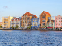 Colourful coastal wall mural featuring Willemstad waterfront skyline