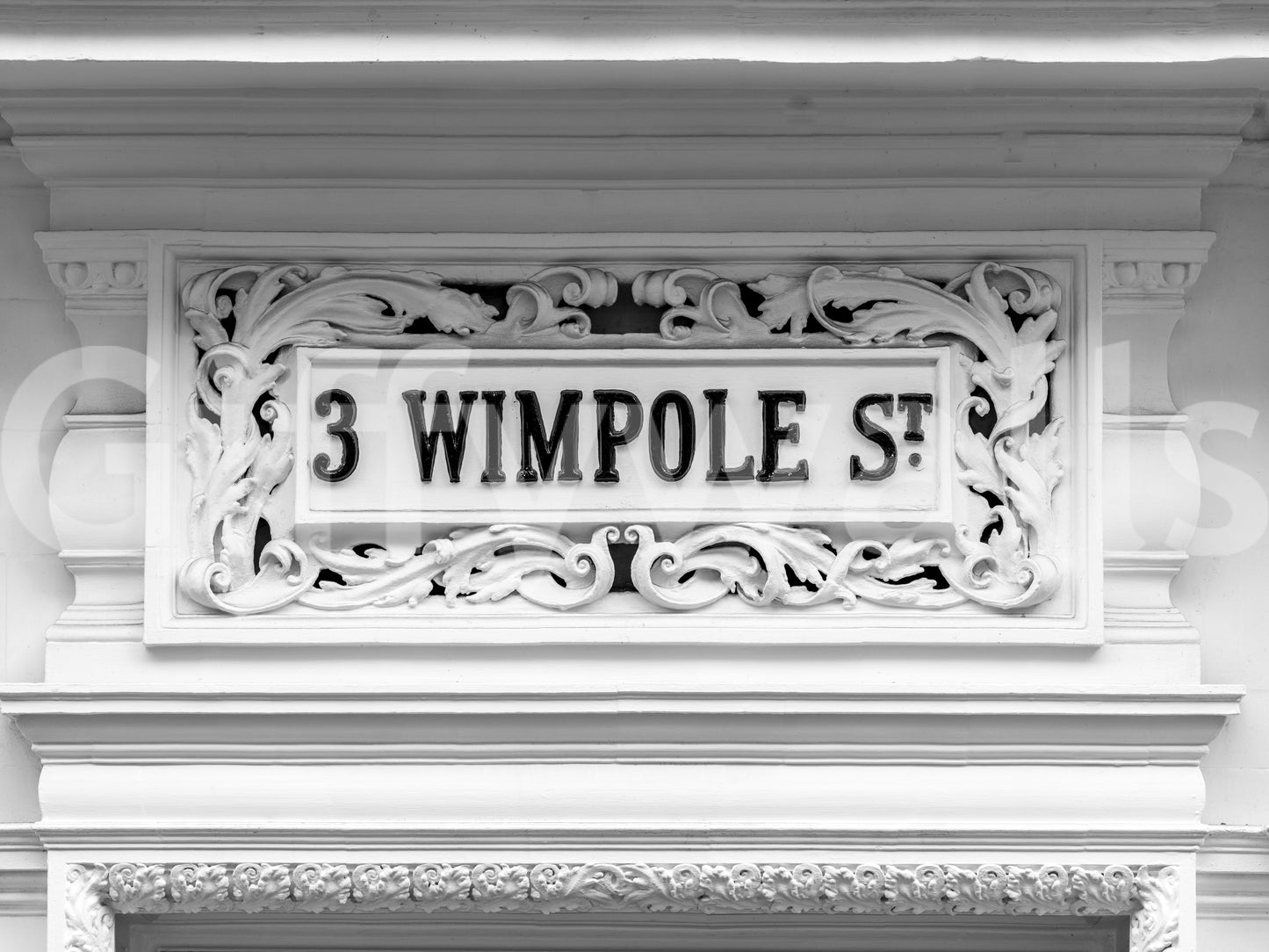 Historic stone plaque wall mural with intricate craftsmanship