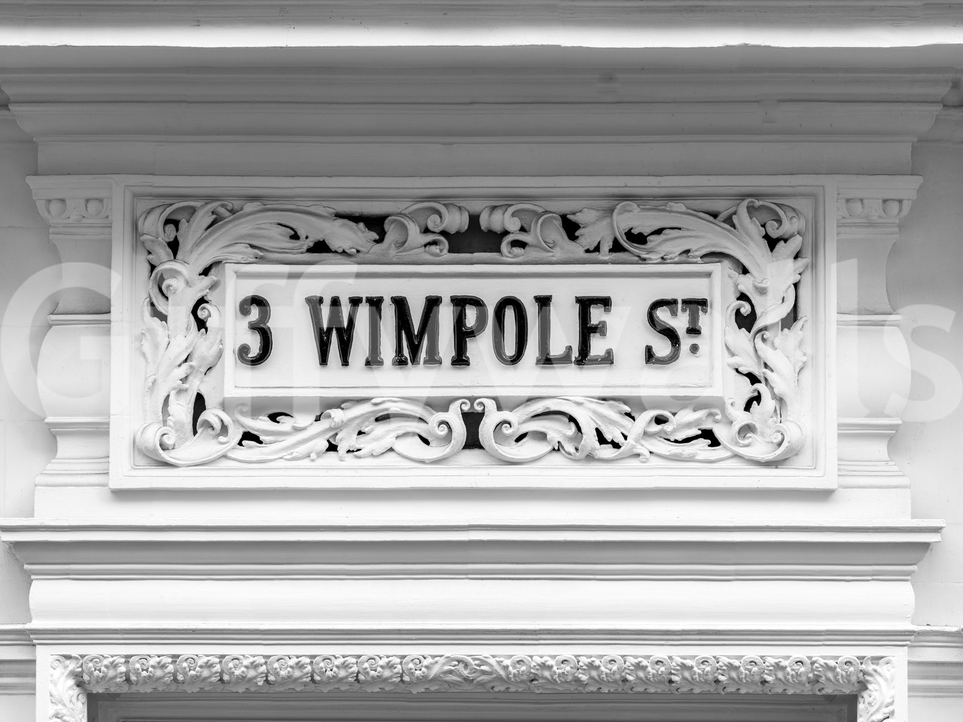 Historic stone plaque wall mural with intricate craftsmanship