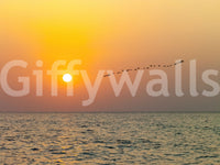 Golden Sea Horizon and Migrating Birds Wall Mural