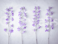 Close view of the lavender wallpaper print with violet blooms on slim stems GD13138