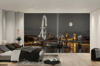 Mural of London landmarks with moon in the background

