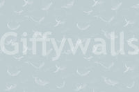 Coastal style whale wall decor for an apartment hallway.