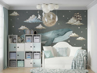 The scene features soft clouds and a light blue sky.

