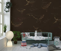 Large whale print in a bright apartment living room.