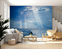 Ocean-inspired wall mural in a modern living room, soft blue waves and coastal tones for wall decor