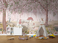 Standard Unicorn Forest Pink Wall Mural in a playroom with a white storage cabinet and a cozy play teepee.