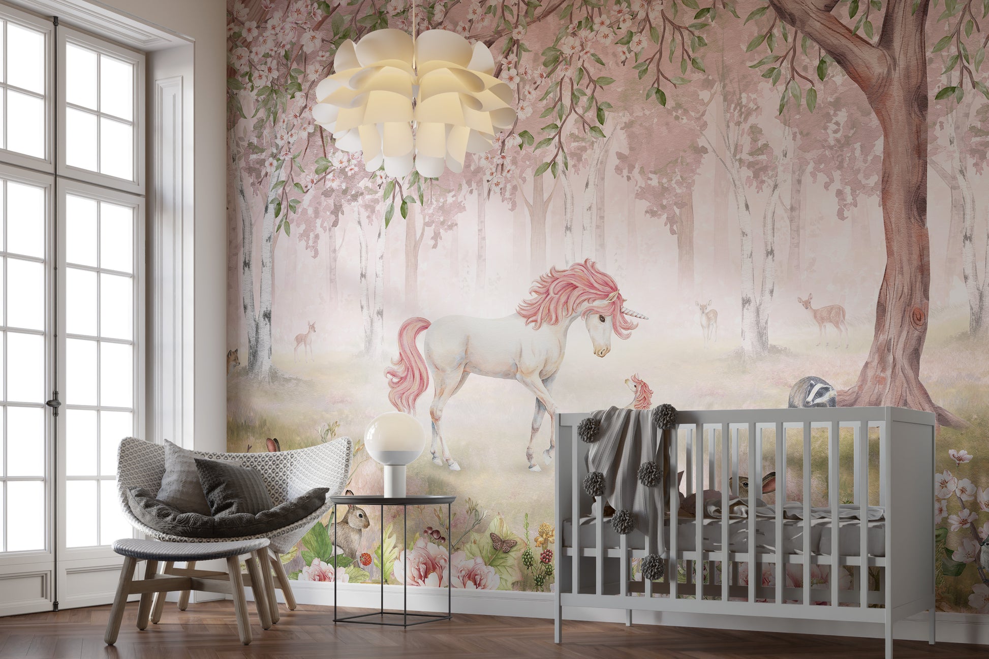 Premium Unicorn Forest Pink Wall Mural in a nursery with a sleek grey crib and a decorative cloud pendant light.
