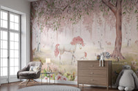 Canvas Unicorn Forest Pink Wall Mural in a room with a brown dresser and grey chair near a large window.