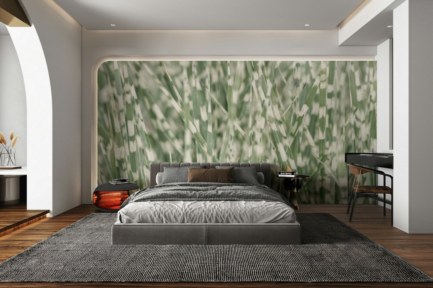 Features a detailed close-up of tall, variegated grass blades.
