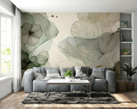 Sage floral mural on a feature wall in a modern bedroom with linen bedding.