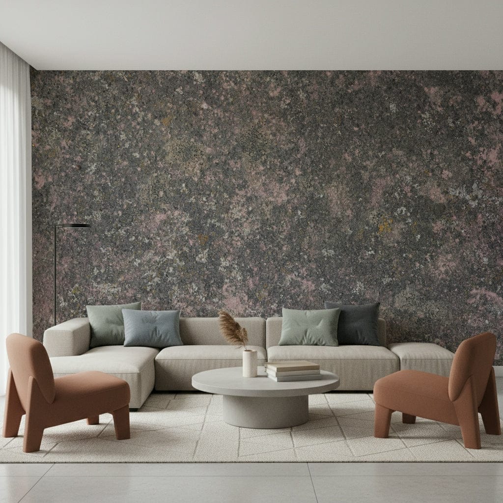 Whispers of Pink Stone wallpaper mural of pink-flecked grey stone behind a cream sectional and terracotta chairs