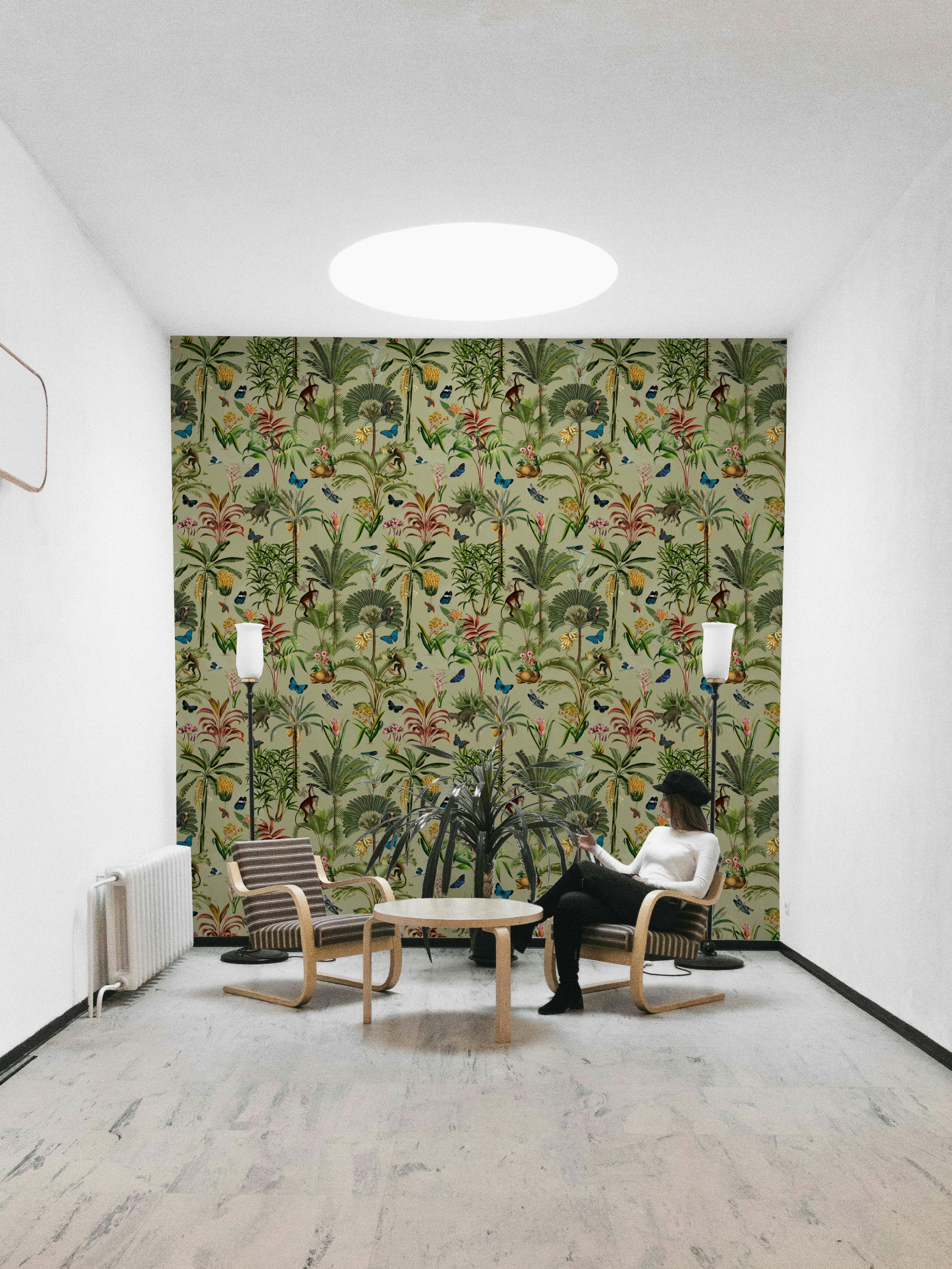 Jungle-inspired floral mural with airy watercolor backdrop.

