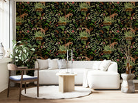 Nature-inspired wall mural with vibrant plants and wild animals.

