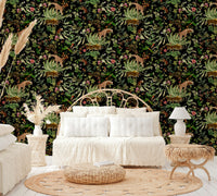 Bold wildlife mural wallpaper with lush plants and exotic creatures.

