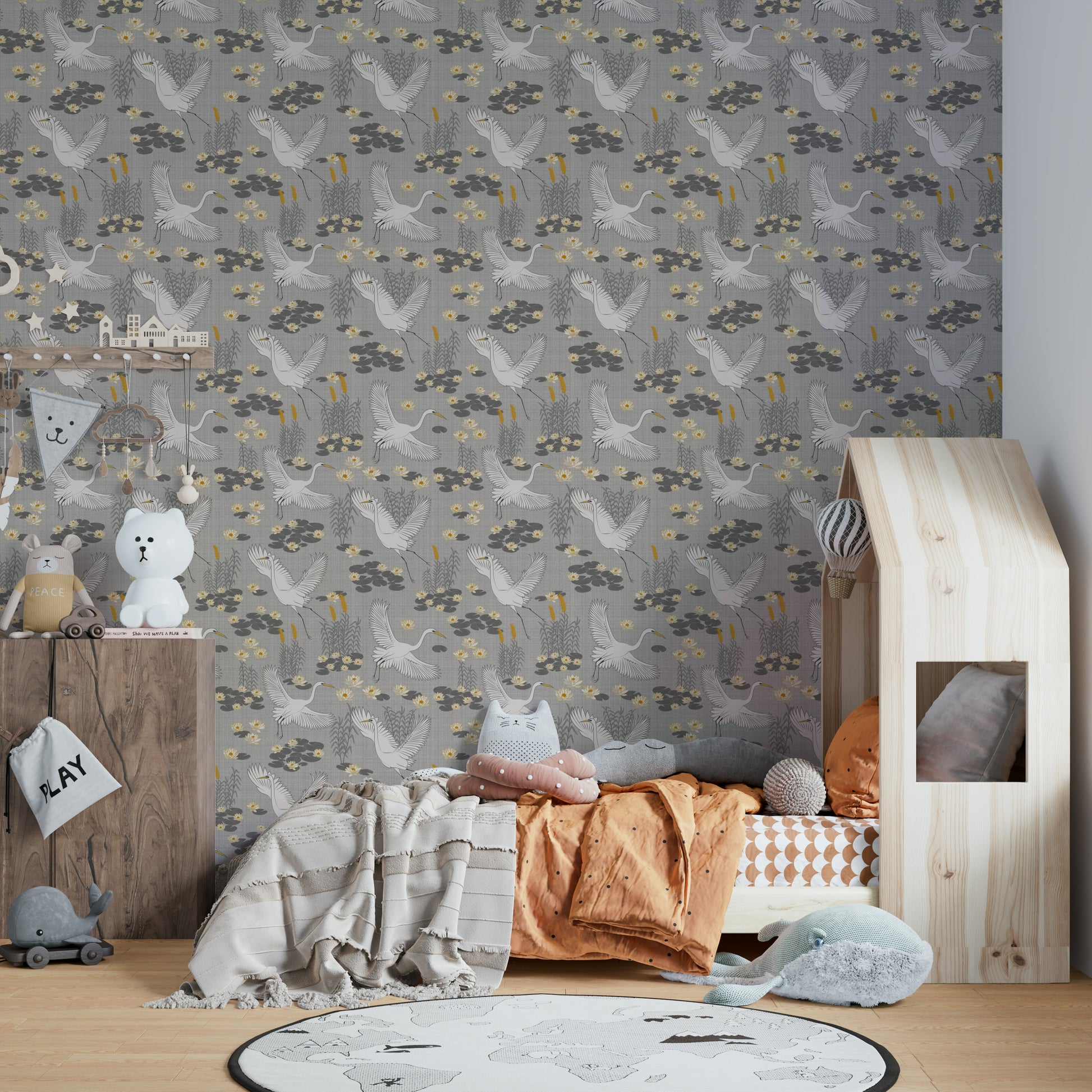Coastal-inspired wallpaper with herons