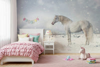 Snowdrift Horse wallpaper mural of a white horse in snow above a white dresser and teddy bear basket in a kids room