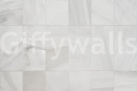 White Stone Blocks wallpaper mural close-up showing the grid of pale white and grey marble-like tiles