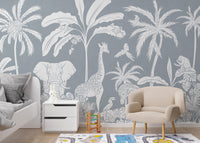 Temporary Monochrome Jungle Blue Wall Mural in a nursery with a white nightstand and a cozy beige armchair.